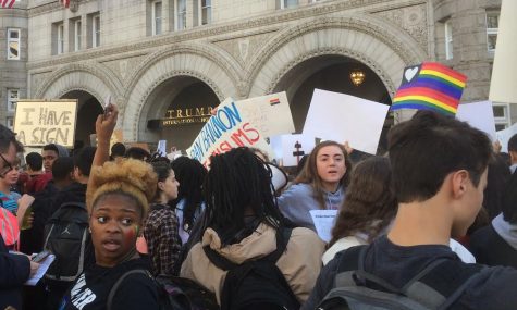 The protesters congregate around the newly opened Trump Hotel at the beginning of the march. From there, they went on to march across most of DC. Photo by Yael Hanadari-Levy.
