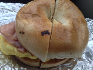 A ham egg and cheese bagel sandwich from Izes. 
