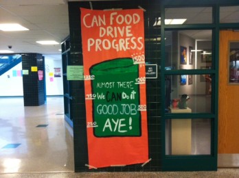 After two weeks, the canned food drive had reached its goal and raised 1,630 cans for the Manna Food Center.