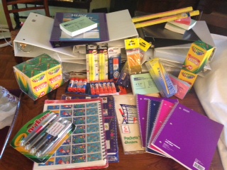 School supplies donated by students to send to impoverished students in Haiti.