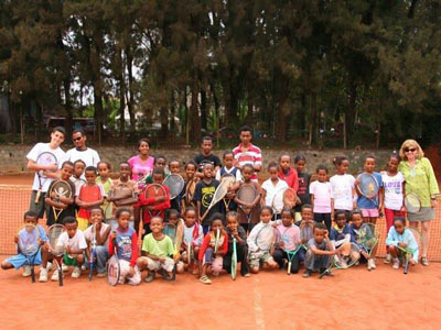 A group of the kids, whom the organization Advantage Ethiopia has helped, poses for a shot with club president and co-founder Leo Blumberg-Woll.