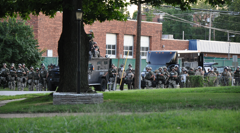 Riot-ready SWAT teams in Ferguson patrol the streets on August 15, 2014 at 3pm. 