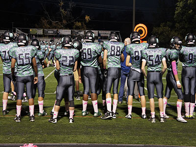 WJ Football players stand on the sideline during their homecoming game victory against Northwood.