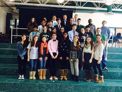 The forensics team poses  with their County Champions Plaque earlier in March.