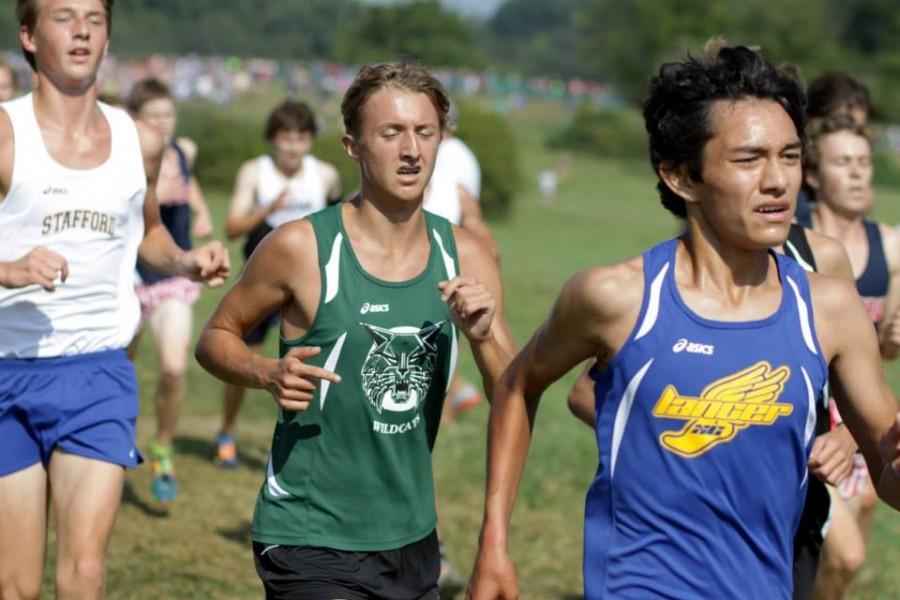Junior and Cross Country runner Carter May surges forward at a competitive Oatlands Invitational.