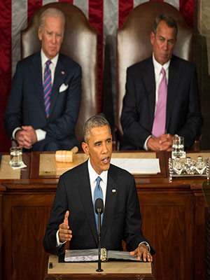 Obama makes the 2015 State of the Union Address, accompanied by Vice President Joe Biden and Speaker of the House John Boehner. 