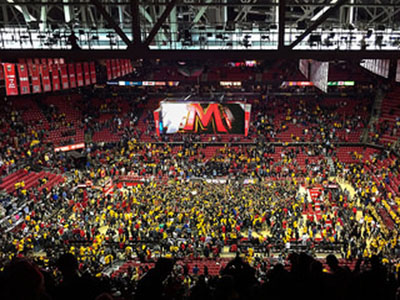 An electrified crowd storms the court after Marylands upset win over No. 5 Wisconsin.
