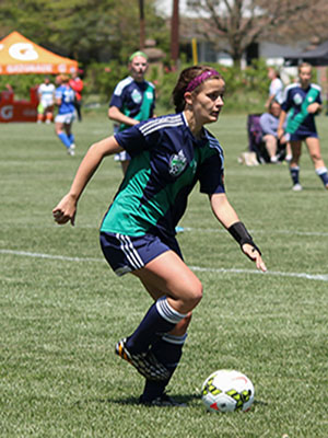 Junior girls soccer recruit Alexis Montgomery controls the ball for her club team.  Montgomery has committed to Delaware.