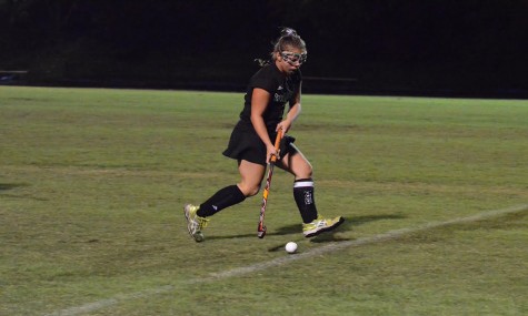 Senior Elizabeth Batwinis controls the ball down the field.
