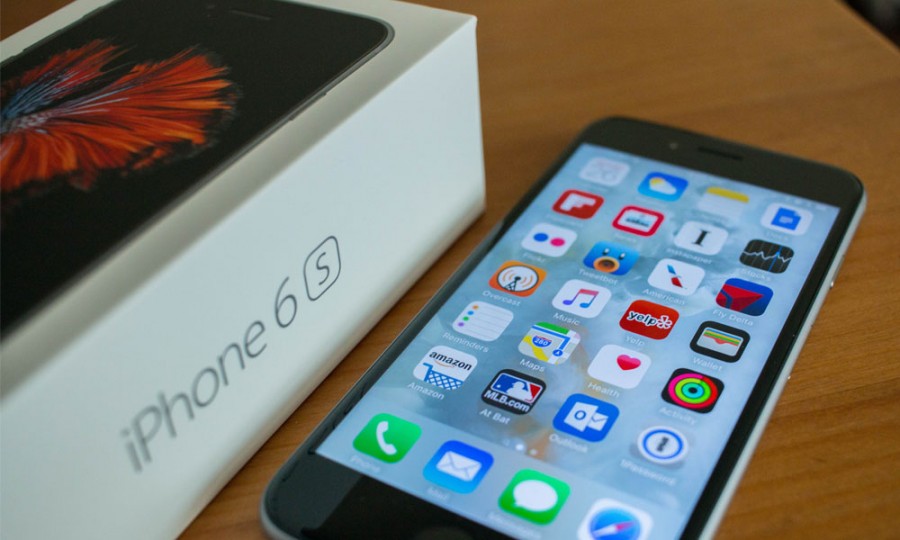 Apple releases new iPhone, breaks records