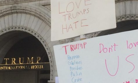 Protesting students, many carrying handmade signs with statements against Trump and his administration, gather at Trump Hotel to start their march. Photo by Yael Hanadari-Levy.