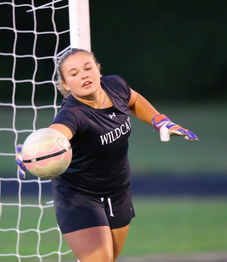 Soccer goalkeeper performs on and off field