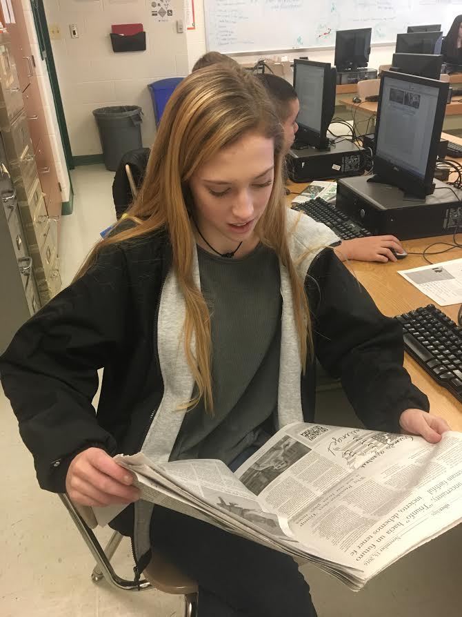 Senior Sheridan Okelly relaxes with her monthly copy of the Pitch, soaking in all the new trends of 2017
