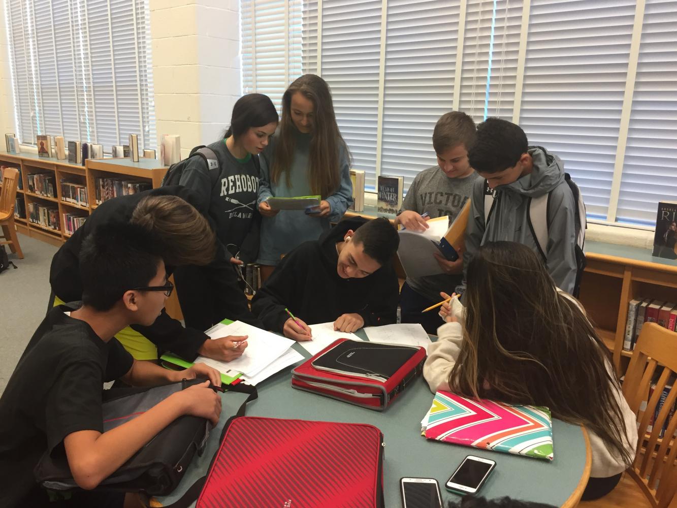 Before the first period bell rings, freshmen catch up on their homework in the media center and prepare for the rest of their day.