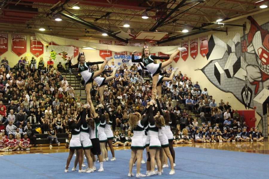 WJ cheer does their one leg stunt during the competition on Saturday. WJ took away the spirit award from Blair who has had it the past twelve years. 