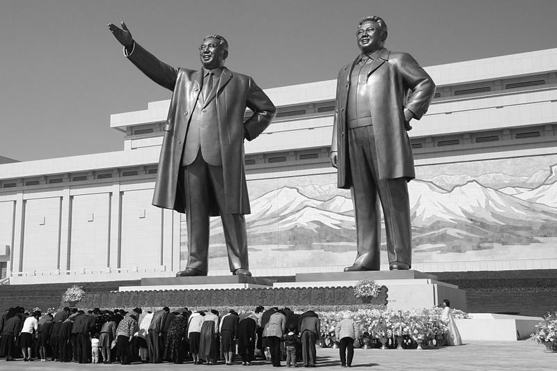 North Koreans pay homage to statue of Kim Il Sung and Kim Jong Il in Pyongynag, North Korea. The invitation of the DPRK to participate in the 2018 Olympic attracted unwarranted hopes of peace. Photo courtesy of J.A. de Roo via Wikimedia Commons