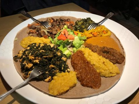 The traditional Ethiopian cuisine consists of selection of meats, vegetales and dips served on a traditional Ethiopian bread. Photo by Rafael Friedlander 