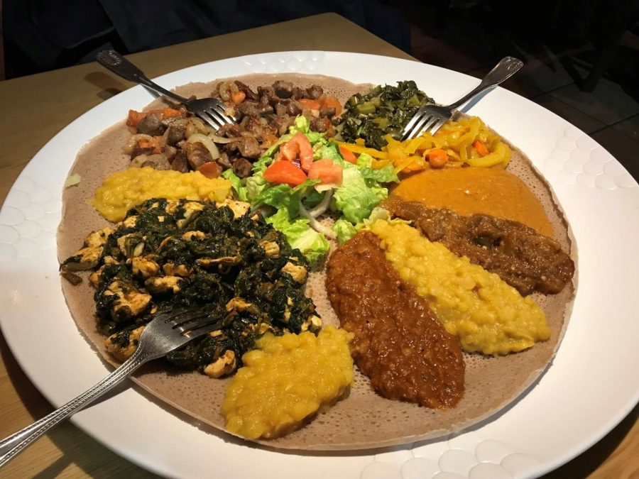 The+traditional+Ethiopian+cuisine+consists+of+selection+of+meats%2C+vegetales+and+dips+served+on+a+traditional+Ethiopian+bread.+Photo+by+Rafael+Friedlander+