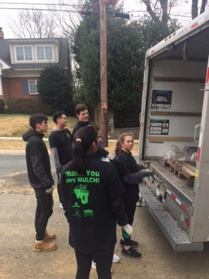 Mulch sale student volunteers wait to unload mulch from the delivery trucks. Photo courtesy of WJ Boosters Club.
