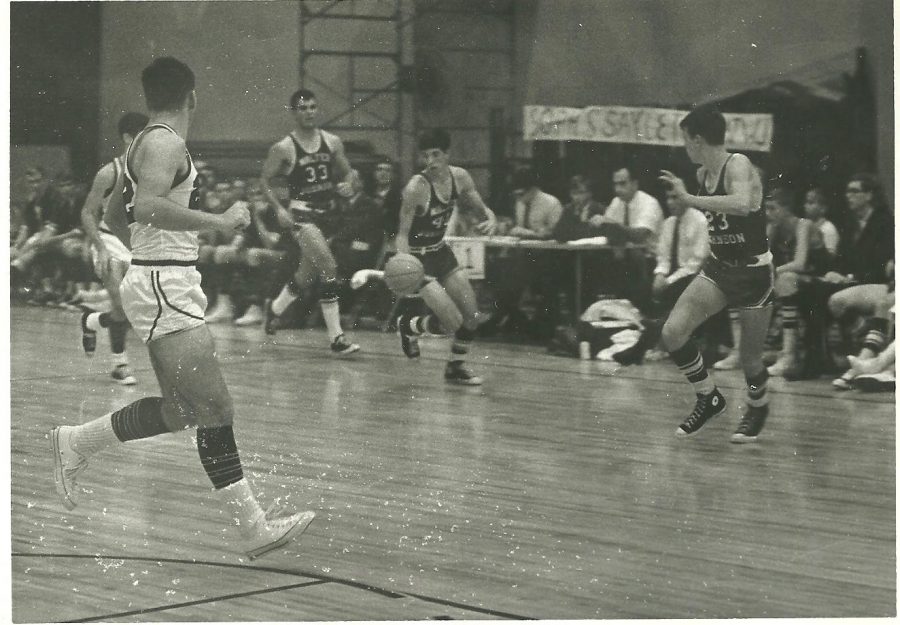 Robb playing basketball in the WJ gym.