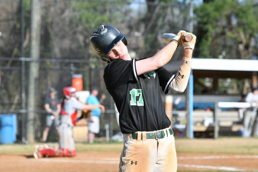 Senior Kyle Peterson hits a ball up at bat. The Wildcats ended their season with a 7-8 record after a loss to Whitman. Photo courtesy of Lifetouch.