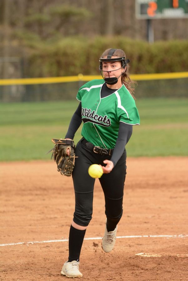 Senior captain Jessica Kaplan tosses the ball to one of her teammates. Softball finished with a 3-7 record this season. Photo courtesy of Lifetouch Studios.