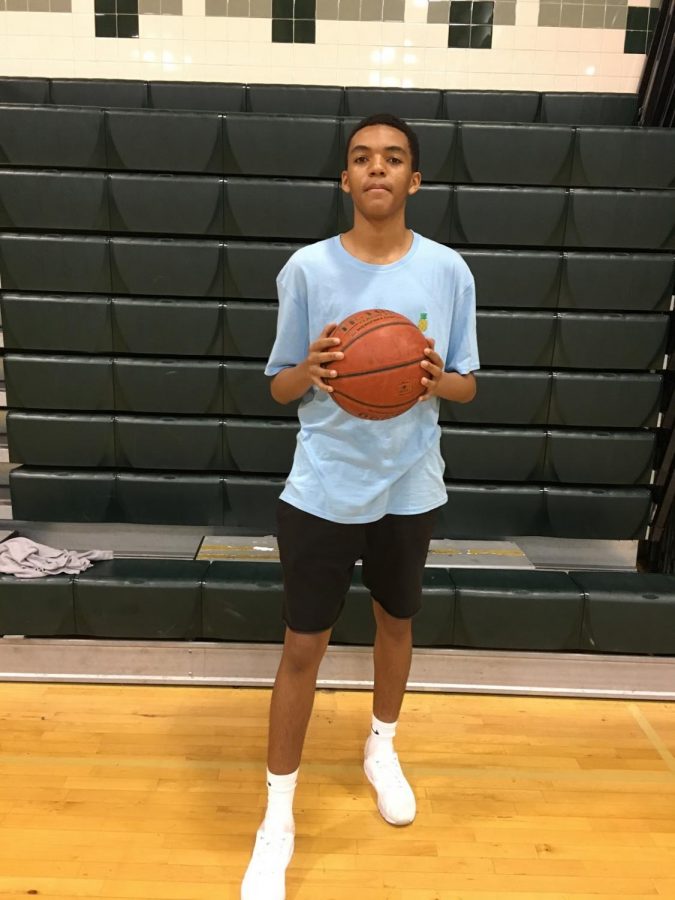 Junior Sean Lynch warms up during game day in the WJ gym. He averaged 10 points in the spring season, while many continue to sleep on his abilities. Photo courtesy of Will Cohen.