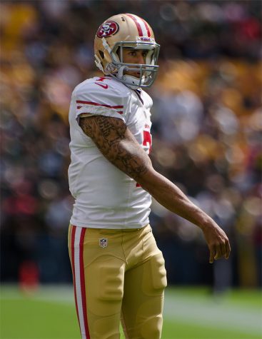 Former 49ers player, Colin Kaepernick preparing for his game against the Green Bay Packers. Photo by Mike Morbeck.
