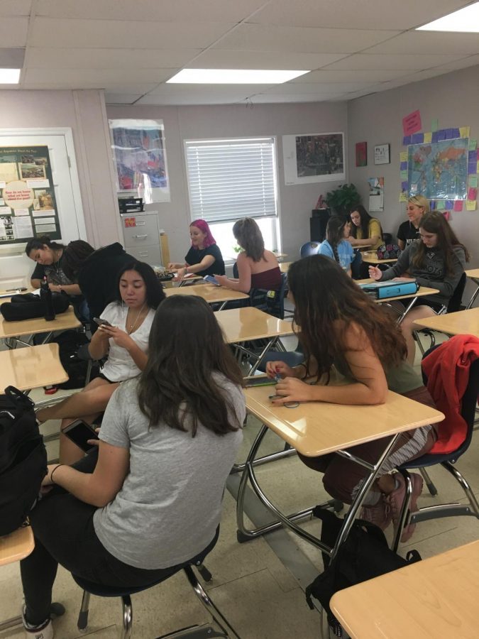 Students in the Womens Studies class get ready for the days lesson. This is the inaugural year of the Womens Studies course at WJ.