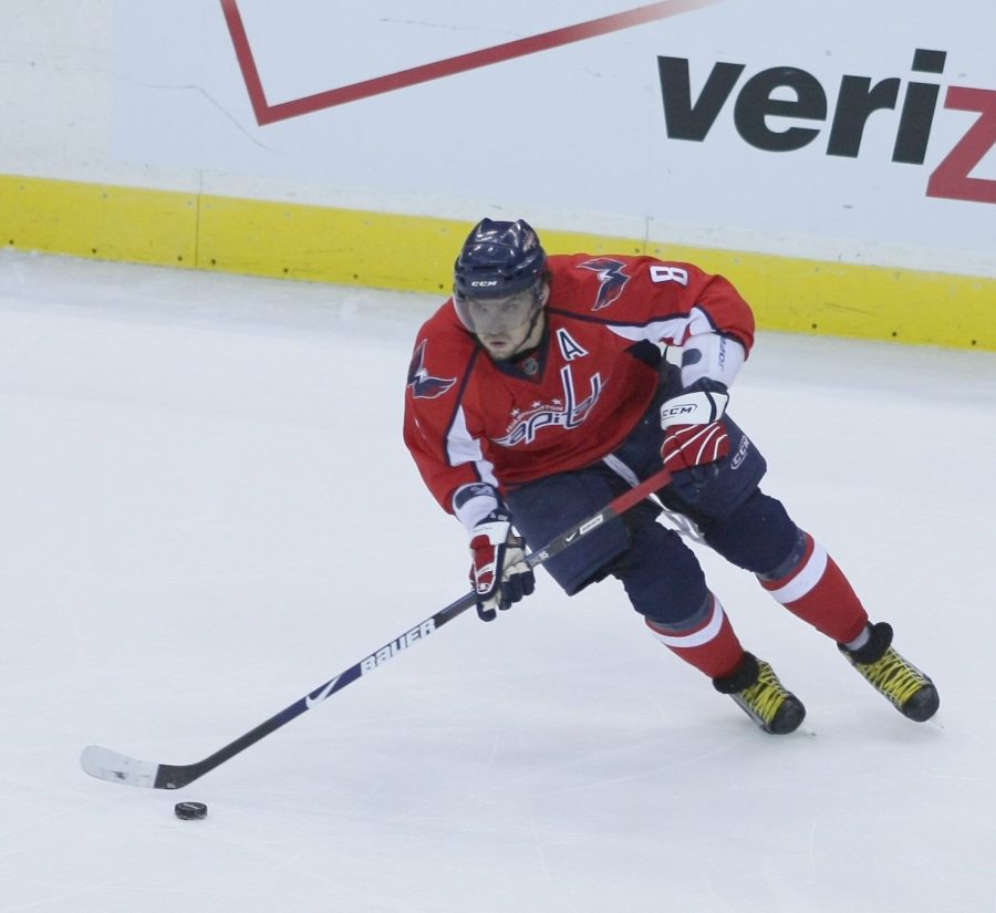 Captain Alexander Ovechkin skates with the puck in a regular season game. Ovechkin looks to lead the team to another Stanley Cup this season.