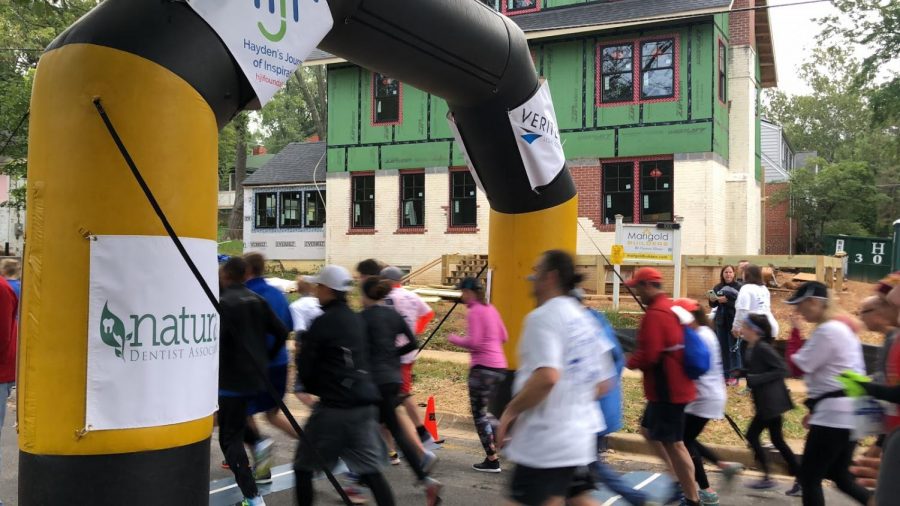 The runners of the 5k cross the starting point at the beginning of the race. This years turnout was the best the HJI foundation has had in all 10 years!