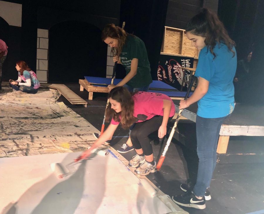 The Paint crew isnt afraid to get messy when it comes to making sure the sets look their best. Be sure to come watch the sets come to life in one of the four performances!