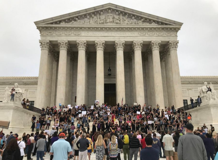Protesters assemble on the steps of the Supreme Court after the announcement of Brett Kavanaughs confirmation.