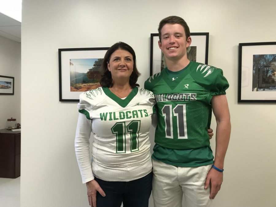 Junior Josh Forburger (right) stands with Principal Jennifer Baker.