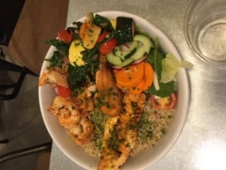 This is Slapfishs Power Bowl. The bowl consisted of mixed-grill seafood, brown rice, crisp veggies, avocado, extra virgin olive oil.