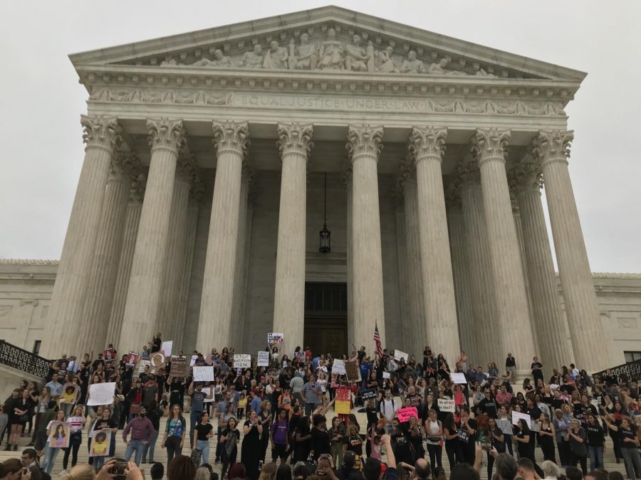 Protesters assemble on the steps of the Supreme Court after the announcement of Brett Kavanaughs confirmation.