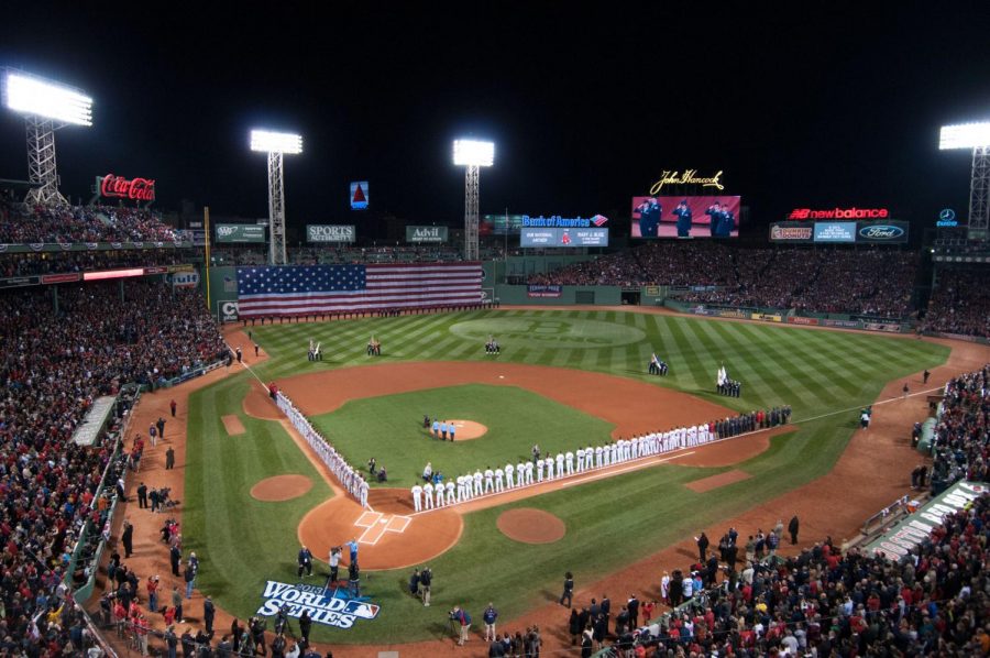 The+Red+Sox+and+Cardinals+lineup+prior+to++the+matchup.+The+stadium+atmosphere+at+this+World+Series+game+is+what+draws+many+fans+to+the+action+packed+postseason.+%0A%0A