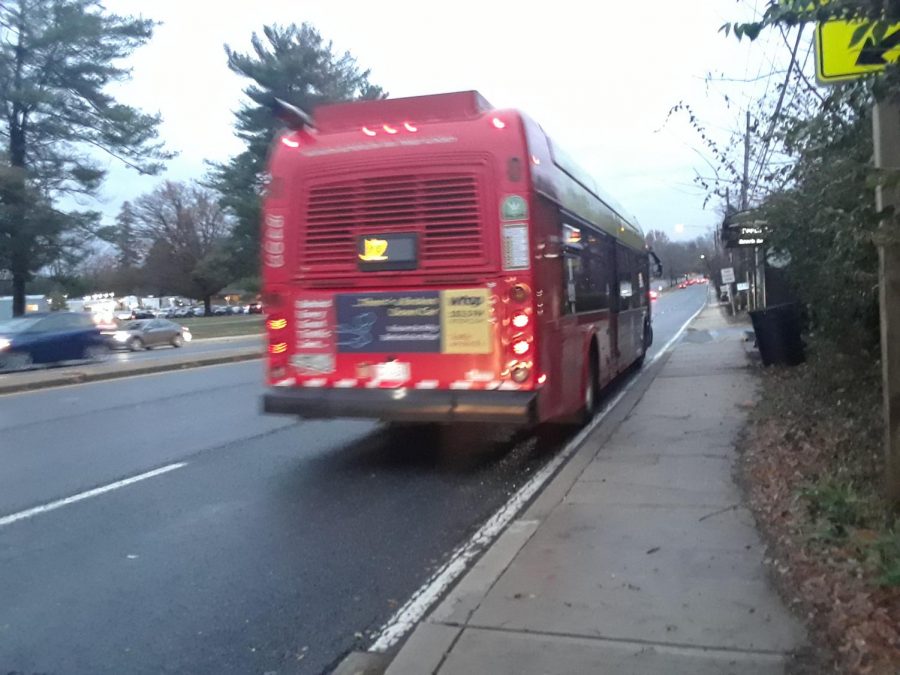 A local bus leaves a shelter along Old Georgetown Road. Buses
such as this are plagued by traffic delays, a problem which
would be alleviated by dedicated bus lanes. 