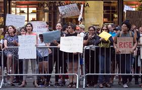 People protest against Trumps immigration polices in Pittsburgh. These protesters are protesting policy which may affect thousands of immigrants lives.