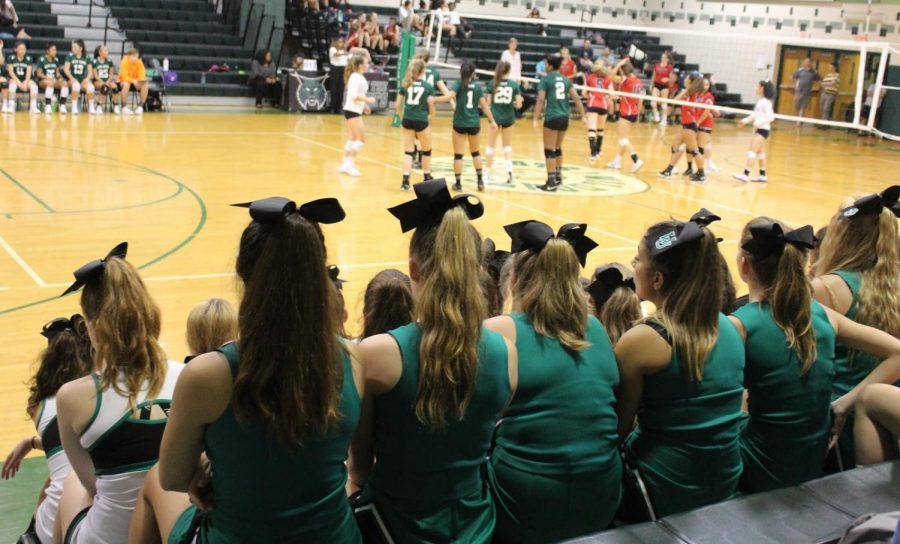 Varsity and JV cheerleading teams attend the girls varsity volleyball game, and cheer them on during their win over Wootton.  In the fall, cheer primarily attended football games, and not many other sports, due to their busy schedule. 