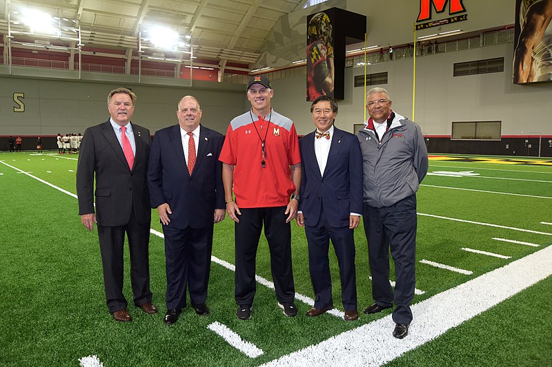 DJ Durkin with Wallace Loh and Kevin Anderson being visited by Governor Larry Hogan. Durkin was fired by Loh shortly after it was announced he would be retained.