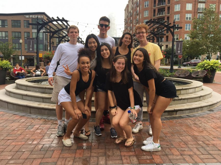 SGA, senior class officers and cameraman Jack Coughlin pose for a picture. They stood in front of the fountain they used for the videos introduction. 