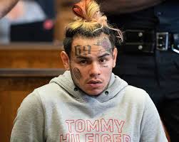 6ix9ine faces charges that could have him in prison for life. The artist sits in prison with no bail. Photo credit to Wikipedia Commons