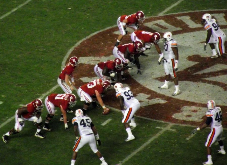 Alabama lines up for a crucial play against Auburn. This year they got past the Tigers with ease and look to continue success in the College Football Playoff.