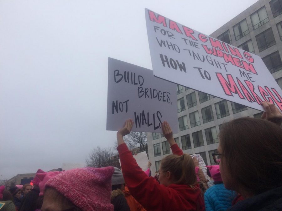 Multiple people at the 2017 Women’s March held up colorful signs with important messages. There were thousands of people at the march and there will likely be thousands more at the 2019 Women’s March.