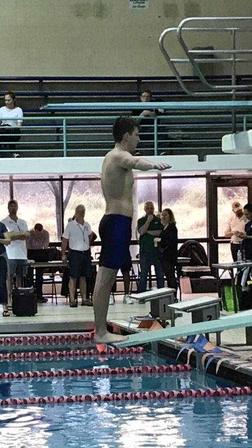Senior+Dermot+OKelly+prepares+for+a+back+dive+against+Blair+at+the+Olney+Indoor+Aquatic+Center.+OKelly+is+one+of+many+seniors+on+the+team+who+hope+to+lead+the+team+to+success+at+states.+Photo+courtesy+of+Dermot+OKelly++