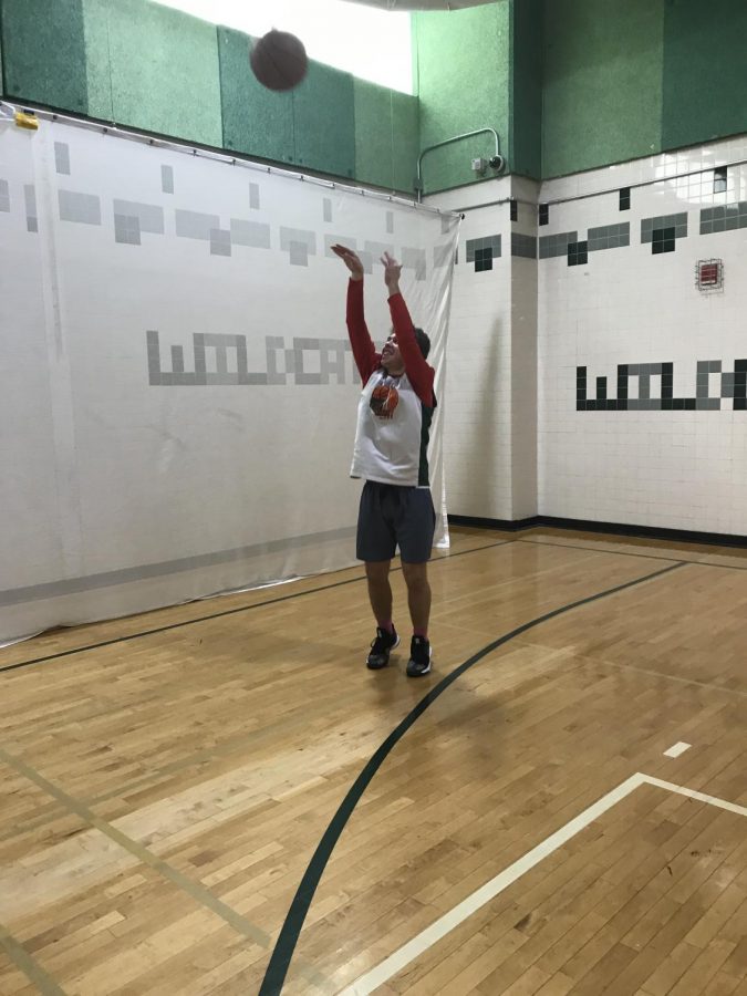 Spencer Mahne pulls up for a jumper in practice. Mahne is second on the team in scoring with 11 points per game.