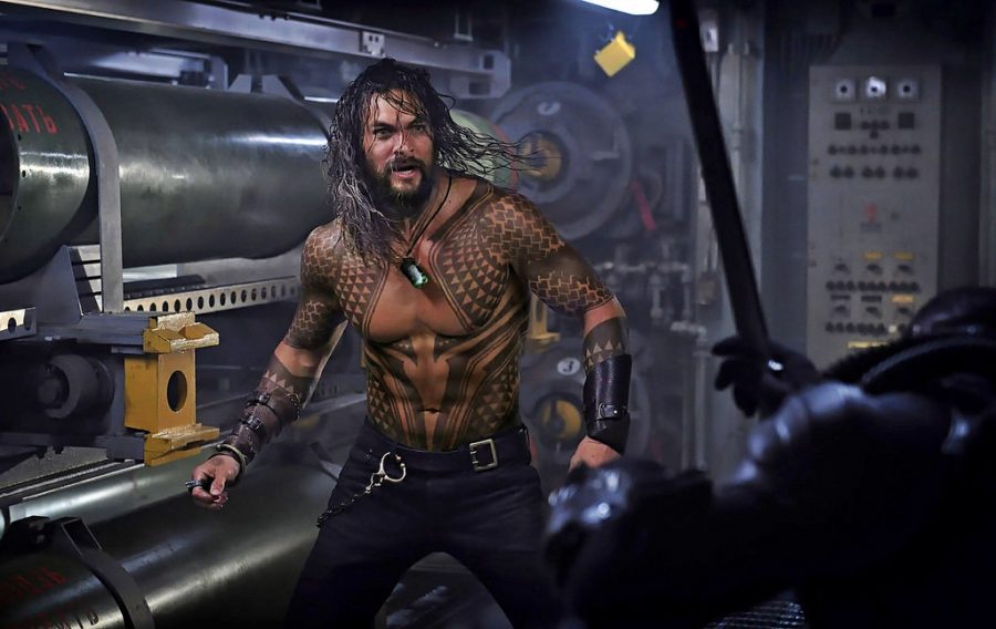 Jason Momoa’s Arthur Curry (Aquaman) fighting Black Manta aboard a submarine. The beginning of the film kicks off with Aquaman intervening in an attempted submarine takeover by Black Manta’s crew. 