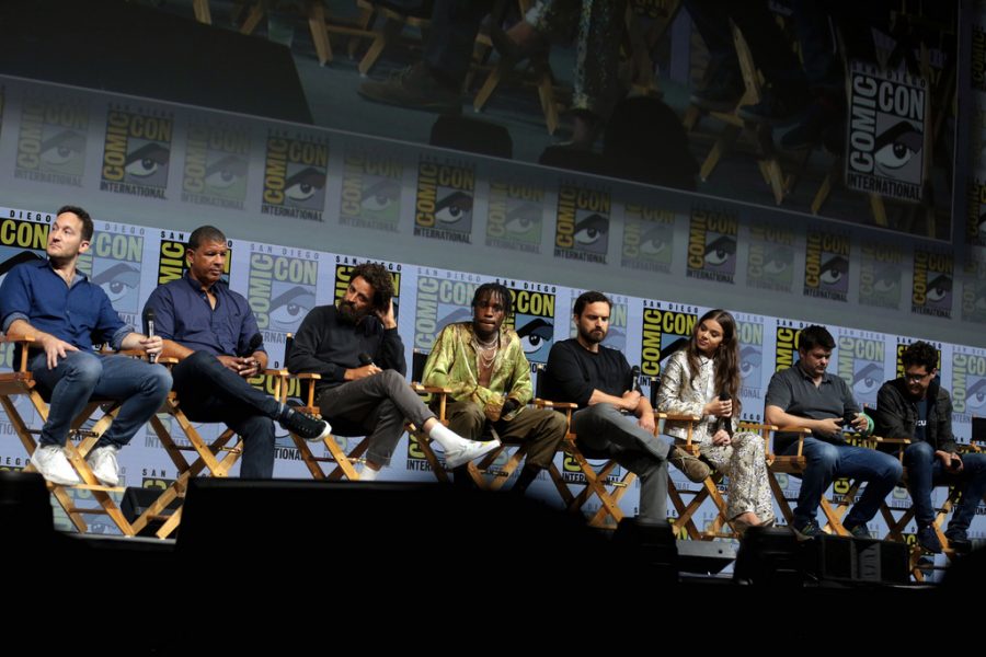 The main cast of Spider-Man: Into the Spiderverse along with its directors and screenwriters speaking at the 2018 San Diego Comic Con International. Plans for the film were revealed as early as 2014, with its casting being released in late 2018. 