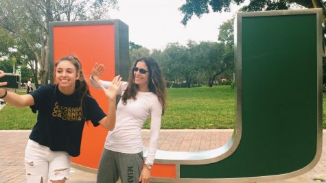 Senior Jadyn Fox poses excitedly in front of the University of Miami sign. Juniors are beginning their college search process.